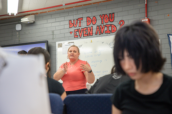 A teacher talks to her students during the bootcamp