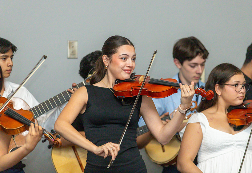 A woman plays violin
